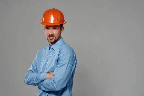 Masculino construtores proteção luz fundo — Fotografia de Stock