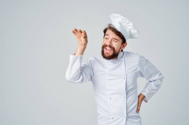 Sakallı adam şef aşçılık sektörü hafif arka planı