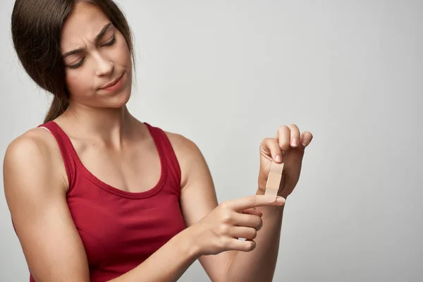 woman cheating finger with plaster health problems injury