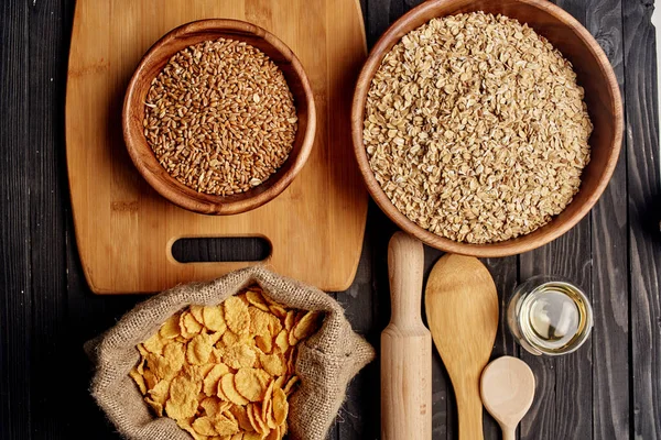 wooden kitchen items cereals products view from above