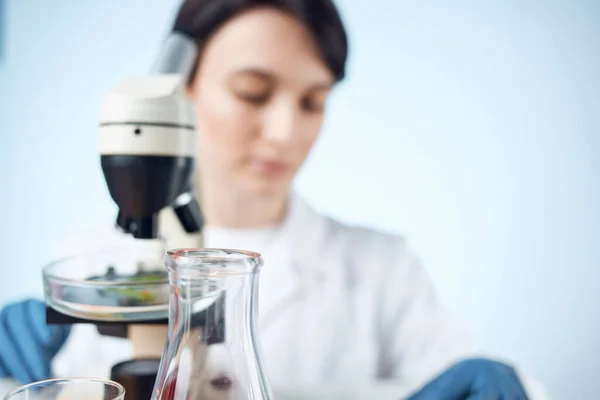 woman scientists microscopes research diagnostics work