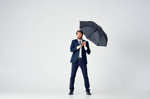 man wearing umbrella rain protection weather