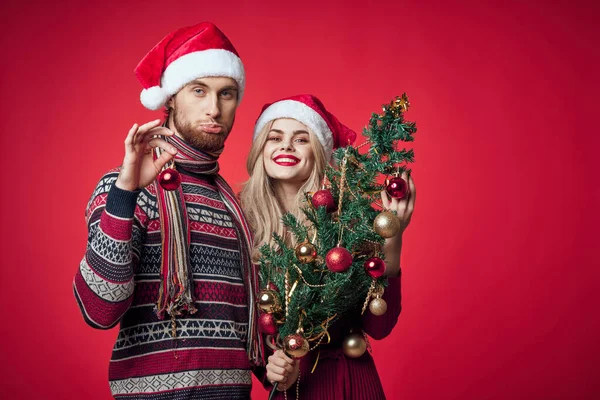 Man och kvinna i nyår kläder semester dekoration romantik — Stockfoto