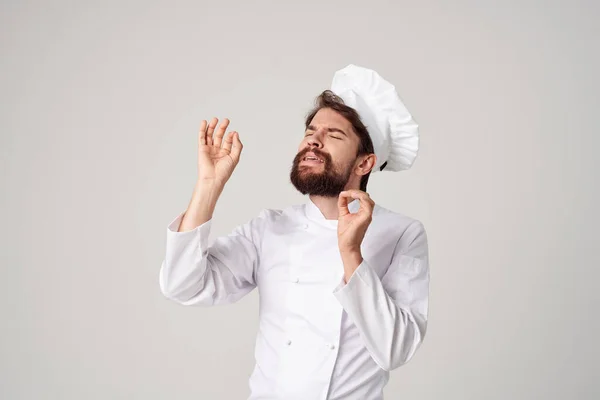 Barbuto uomo chef cucina industria culinaria luce sfondo — Foto Stock