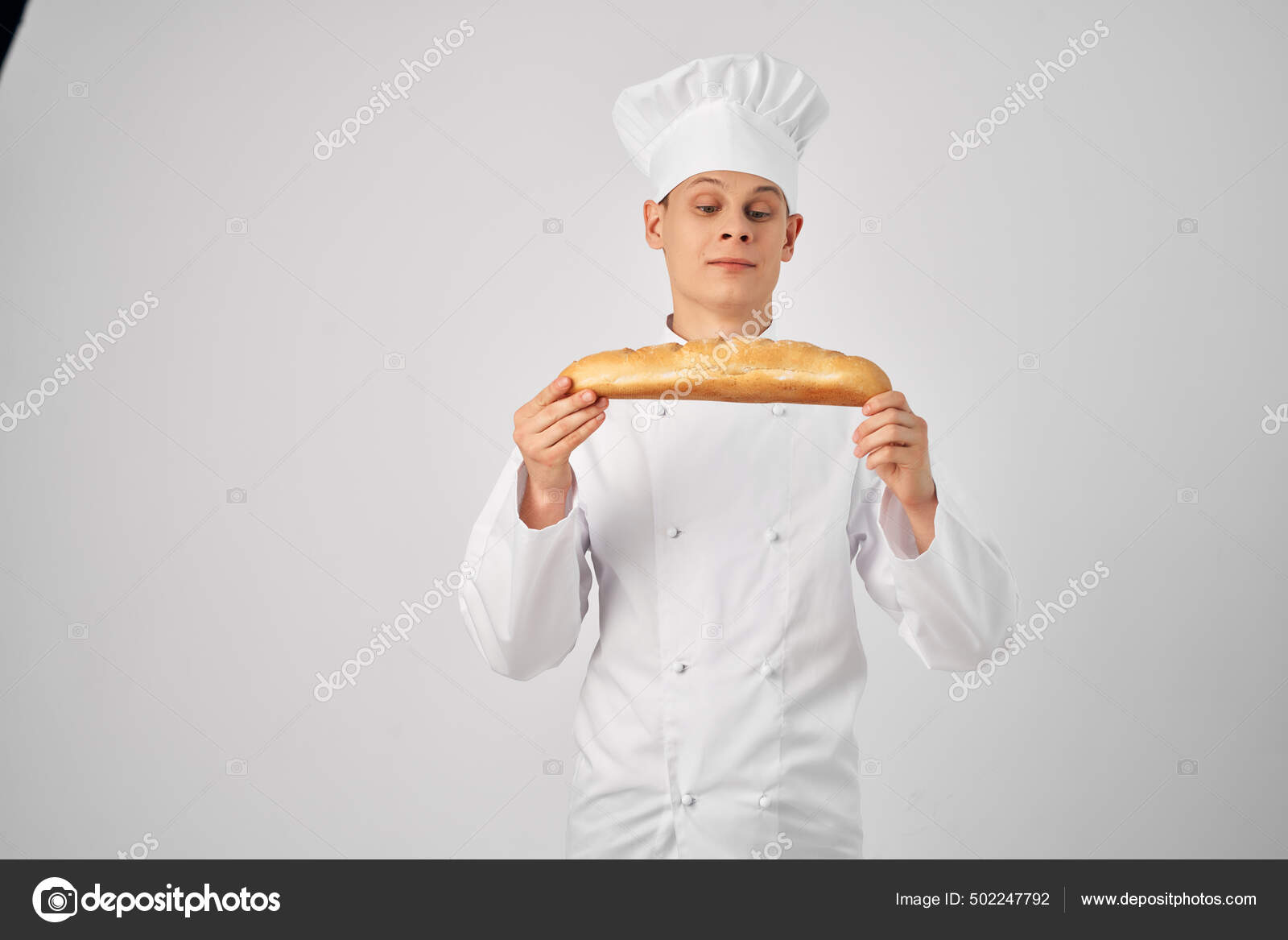 En mand i kokke Holding en brød bager — © ShotStudio