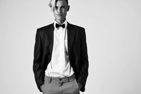 Man in black jacket bow tie fashion modern style posing — Stock Photo, Image