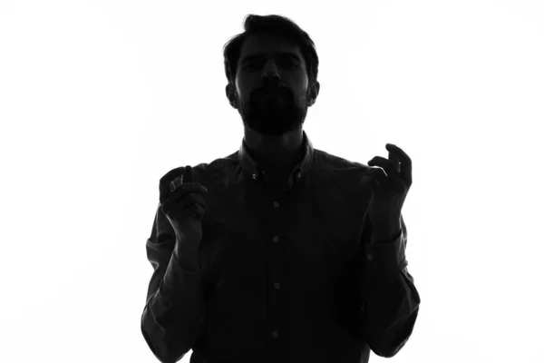 Man Secret agent with a gun in the hands of a crime posing studio — Stock Photo, Image