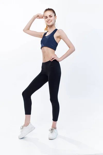 Atlético mujer delgado figura gimnasio energía fitness —  Fotos de Stock