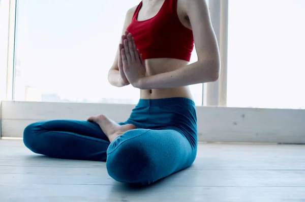 Woman doing yoga lotus position exercise meditation — Stock Photo, Image