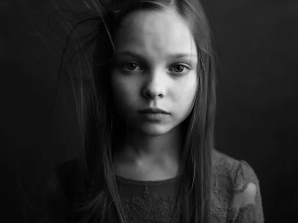 Little girl posing long hair close-up black and white photo — Stock Photo, Image