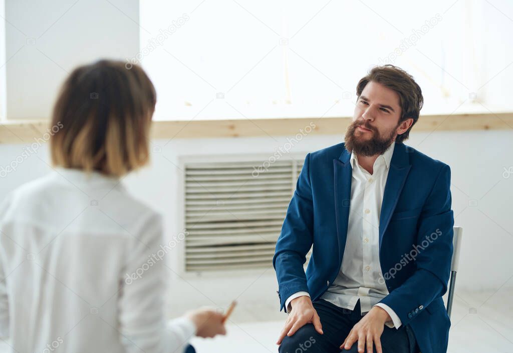 woman psychologist next to the patient communication problems consultation