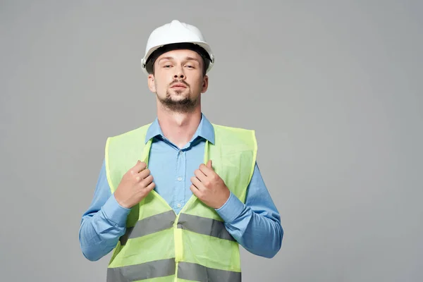 man reflective vest blueprints builder isolated background