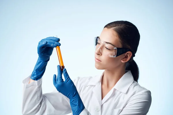 woman scientists laboratory analyzes diagnostics