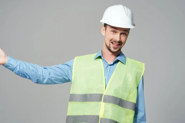 Protezione dei costruttori di sesso maschile professione di lavoro sfondo leggero — Foto Stock