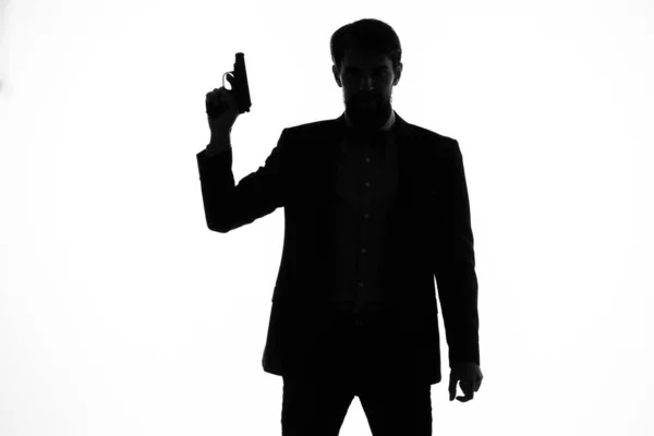 Hombres de negocios Agente secreto con un arma en las manos de un estudio de posando crímenes — Foto de Stock