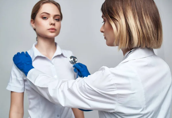 Nurse stethoscope healing procedures isolated background — Stock Photo, Image