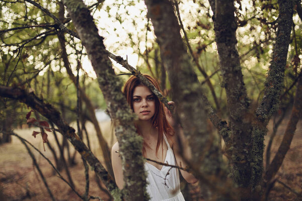 Woman in forest summer white dress nature fresh air. High quality photo