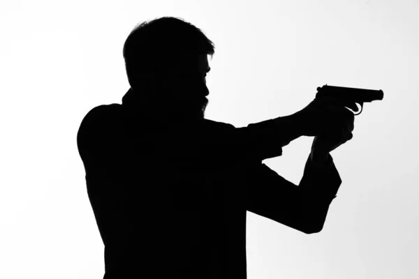 Hombres de negocios pistola en las manos de las emociones silueta aislado fondo — Foto de Stock