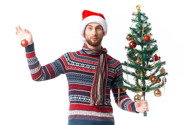 Bonito homem no ano novo roupas decoração natal estúdio posando — Fotografia de Stock