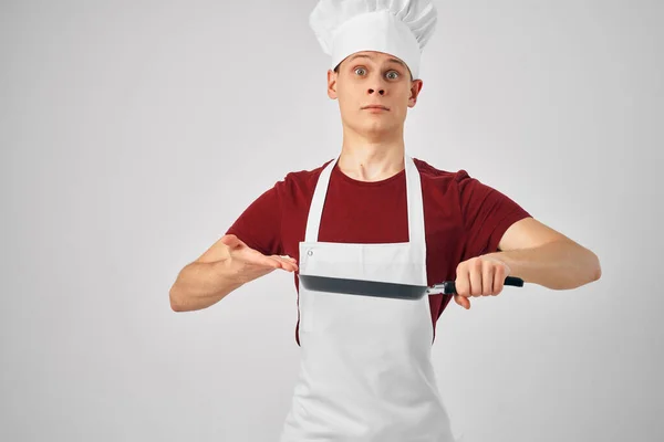 A man in a chefs uniform cooking work professionals — Stock Photo, Image