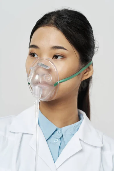 asian woman doctor medicine oxygen mask hospital
