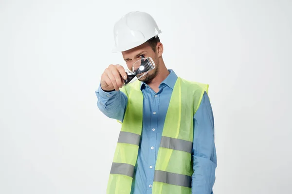 Male builders Professional Job light background — Stock Photo, Image
