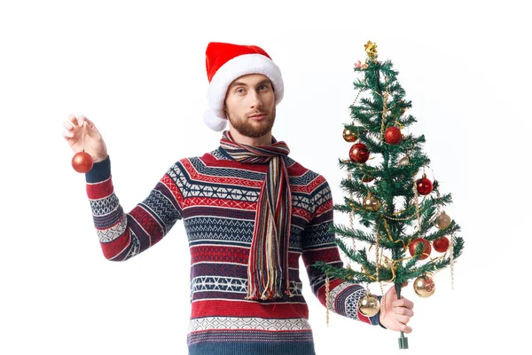 Emotionaler Mann mit Weihnachtsmütze Weihnachtsdekoration Urlaub Neujahr Studio posiert — Stockfoto