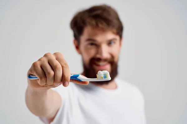 Bearded man toothbrush in hand hygiene clean teeth isolated background — Stock Photo, Image