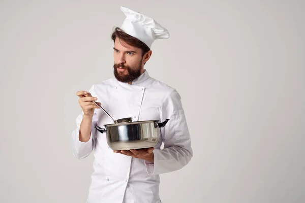 male chef gourmet restaurant cooking light background