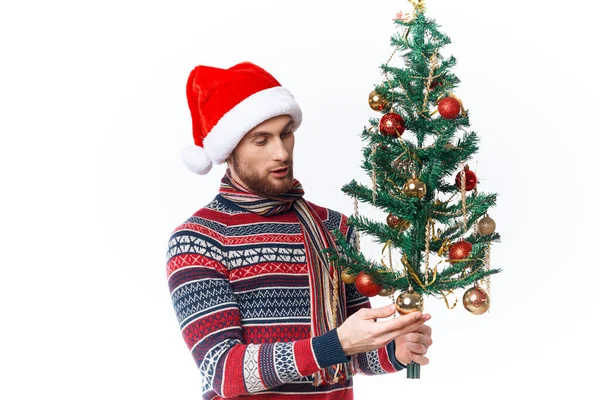 Emotional man in a santa hat Christmas decorations holiday New Year studio posing — Stock Photo, Image