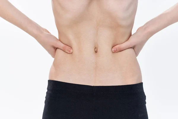 Kvinnlig platt mage anorexi kost hälsoproblem — Stockfoto