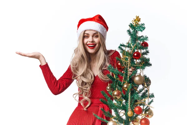 Frau gekleidet als Weihnachtsmann Weihnachtsbaum Tradition Urlaub Licht Hintergrund — Stockfoto