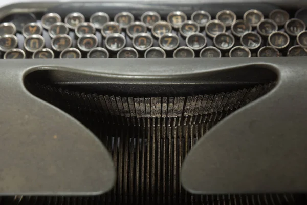 Old typewriter metal letters — Stock Photo, Image