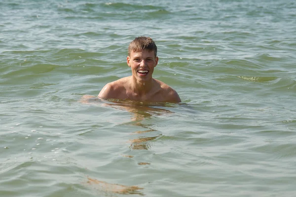 A boy in water — Stock Photo, Image