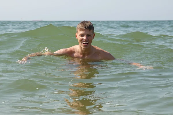 Swimming teen male — Stock Photo, Image