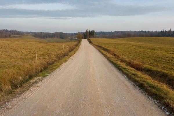 Platteland onverharde weg — Stockfoto