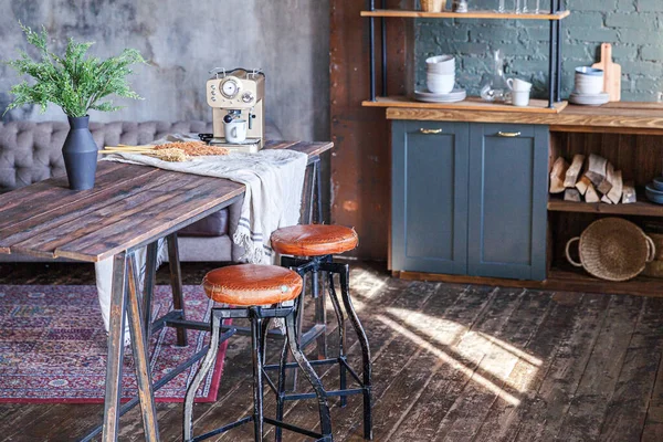 Scandinavian classic minimalistic dark gray kitchen with wooden details. Stylish loft modern gray kitchen decoration with clean contemporary style interior design