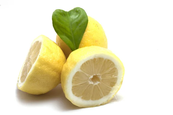 Lemons with heart leaf — Stock Photo, Image