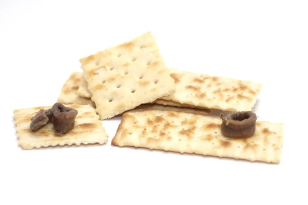 Crackers met ansjovis — Stockfoto