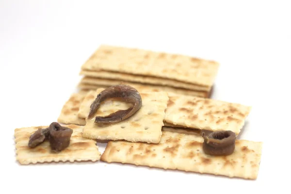 Crackers met ansjovis — Stockfoto