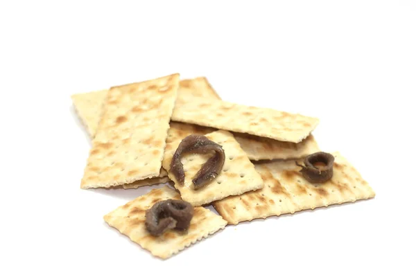 Crackers met ansjovis — Stockfoto