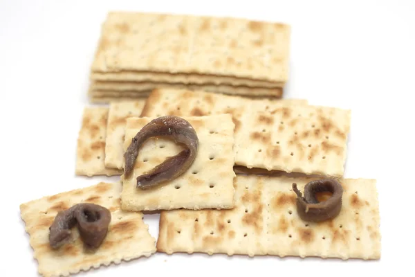 Crackers met ansjovis — Stockfoto