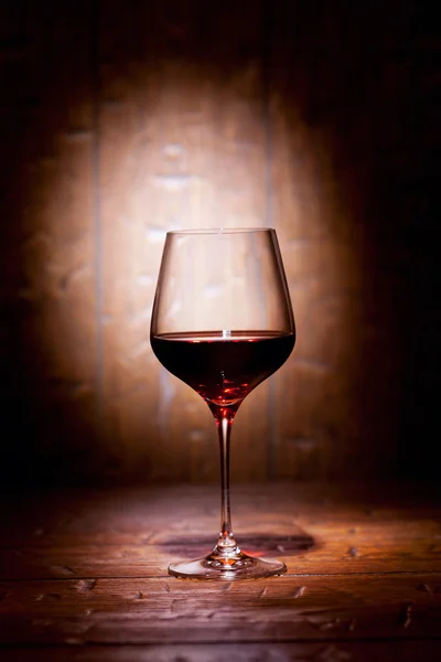 Wine glass on wooden background — Stock Photo, Image