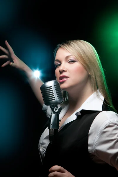 Woman with retro microphone — Stock Photo, Image