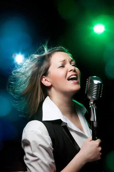 Woman with retro microphone — Stock Photo, Image