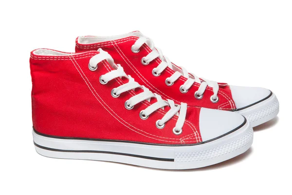 Kırmızı spor ayakkabıları beyaz arkaplanda izole edilmiş — Stok fotoğraf