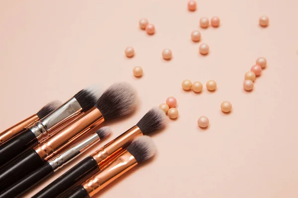 Various Cosmetic Brushes on Pink Background. Makeup Brushes Set for Take Care Skin. — Stock Photo, Image