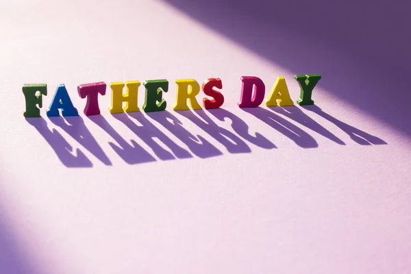 Child Toy Letters Spelling Fathers Day Large Shadow Purple Background — Stock Photo, Image