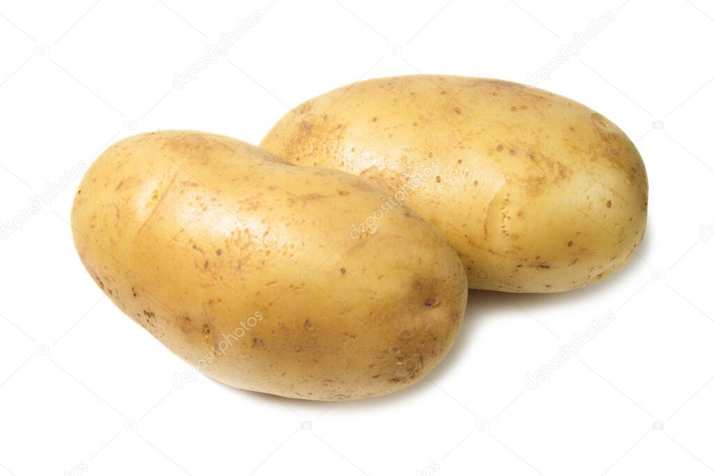 Raw Harvest potatoes isolated on white background