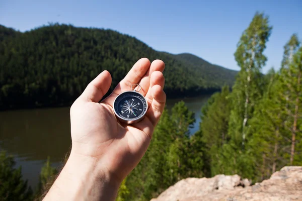 Hand holding the compass — Stock Photo, Image